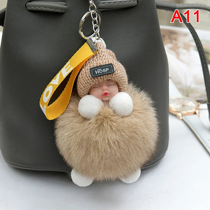 Pompom Sleeping Baby Keychain