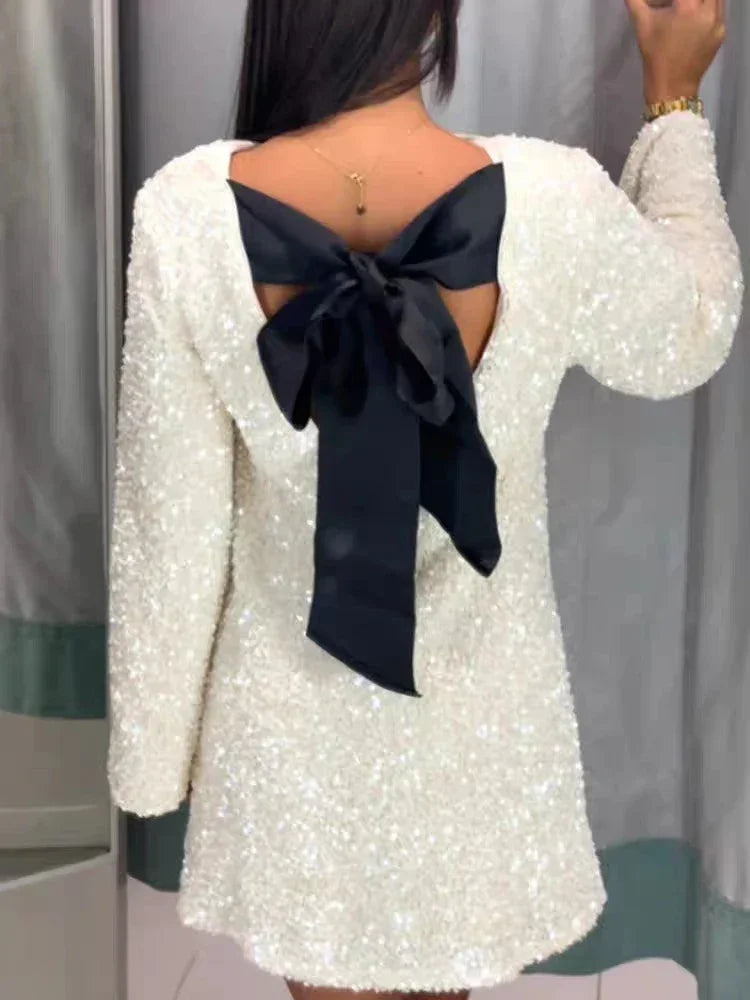 Diorra Flare Sleeve Backless Mini Dress