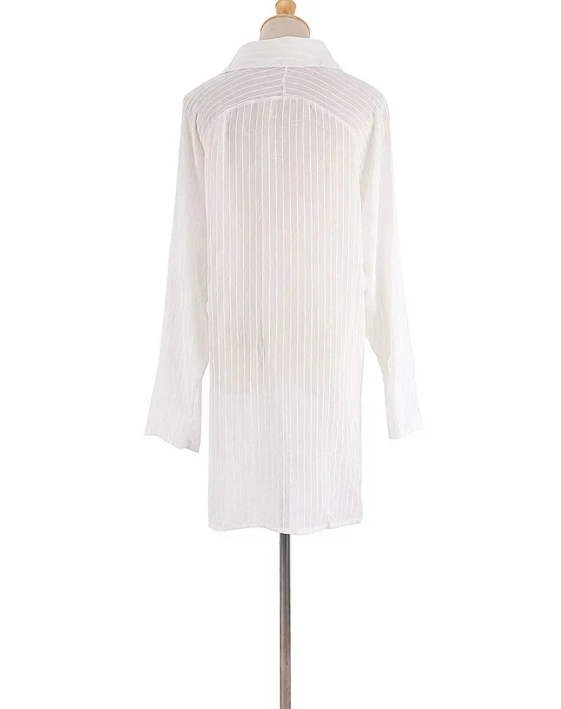 The Coastal Muse Cover-Up