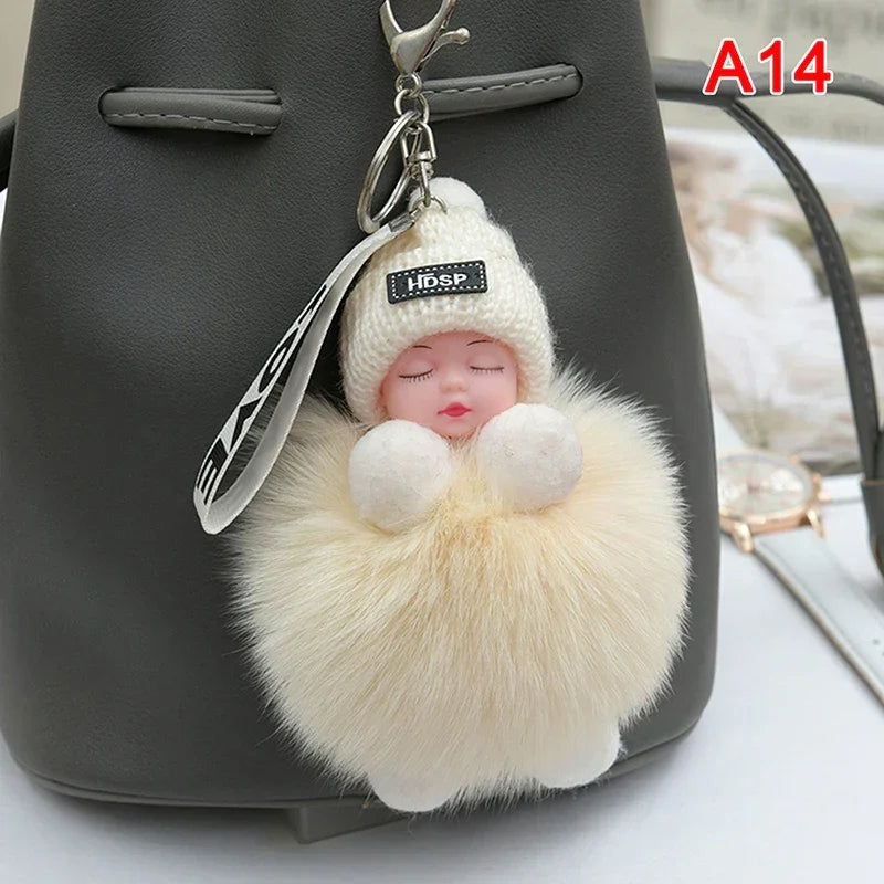 Pompom Sleeping Baby Keychain