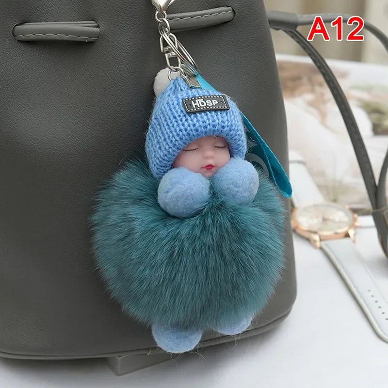 Pompom Sleeping Baby Keychain